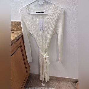 Sweat her Dress in White with slit . Size M